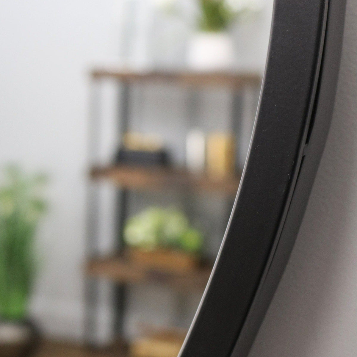 Pebble Mirror – Large irregular black metal wall mirror (110 cm x 90 cm)