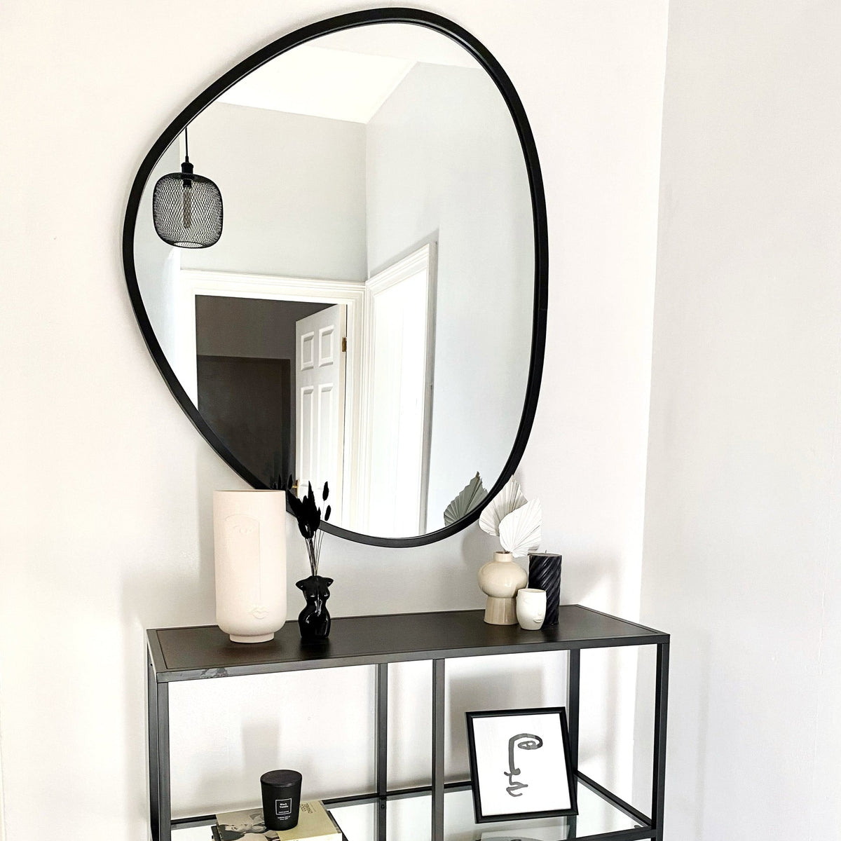 Pebble Mirror – Large irregular black metal wall mirror (110 cm x 90 cm)