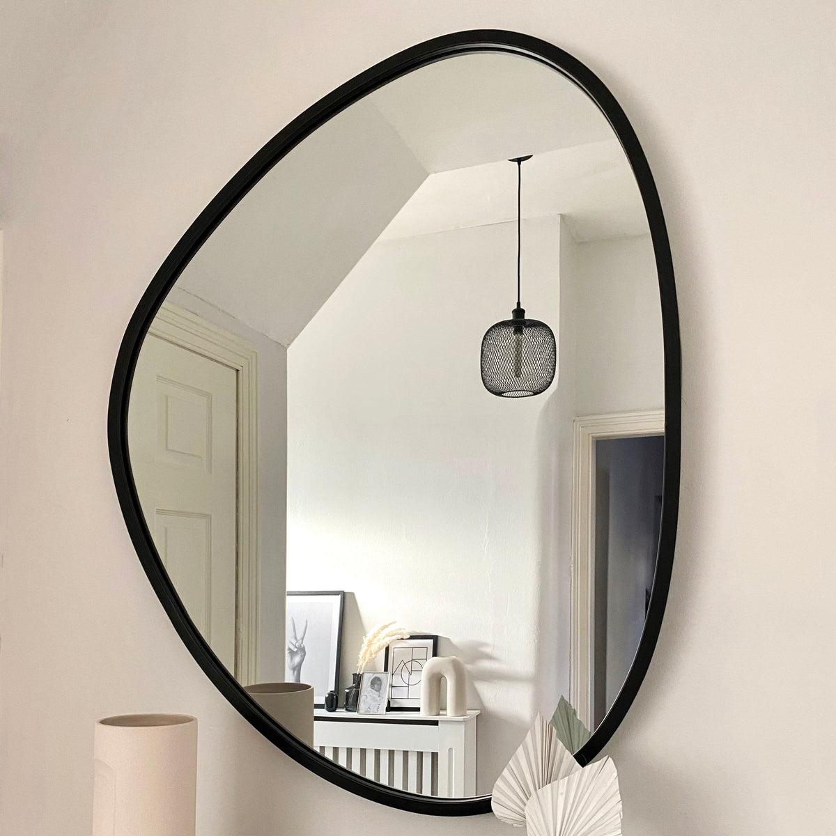 Pebble Mirror – Large irregular black metal wall mirror (110 cm x 90 cm)