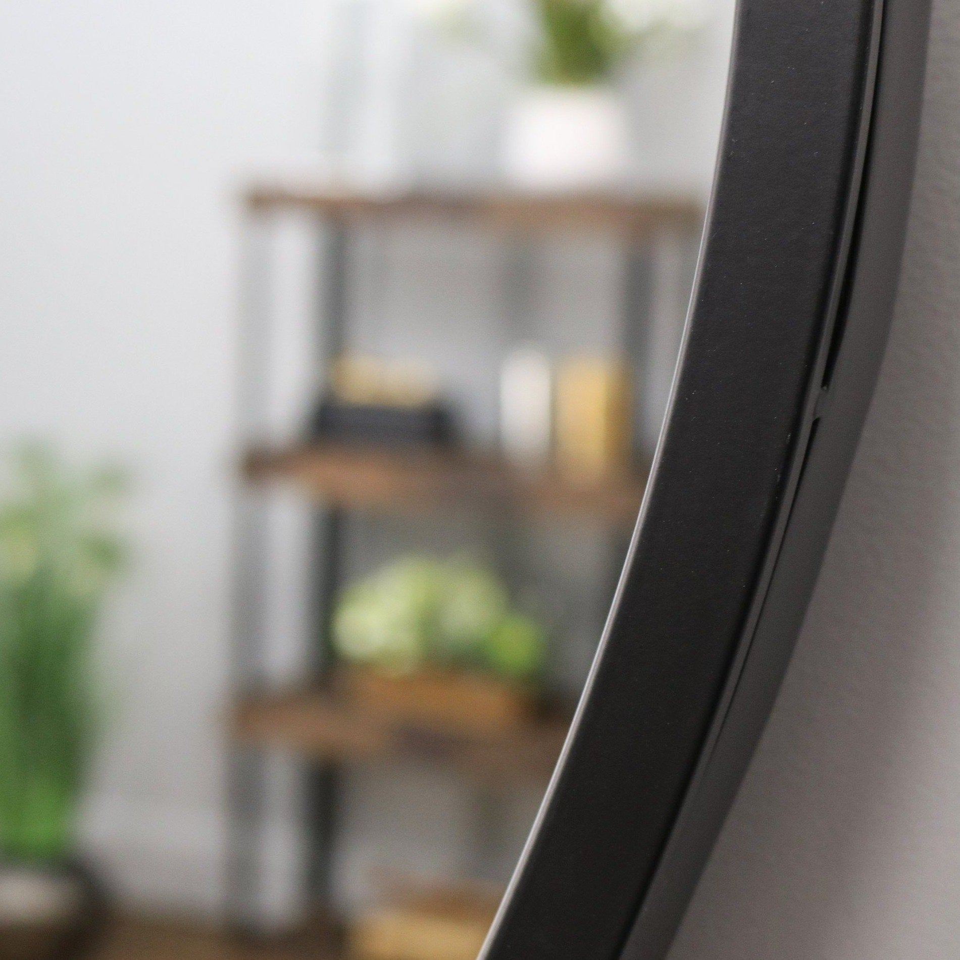 Pebble Mirror – Large irregular black metal wall mirror (110 cm x 90 cm)